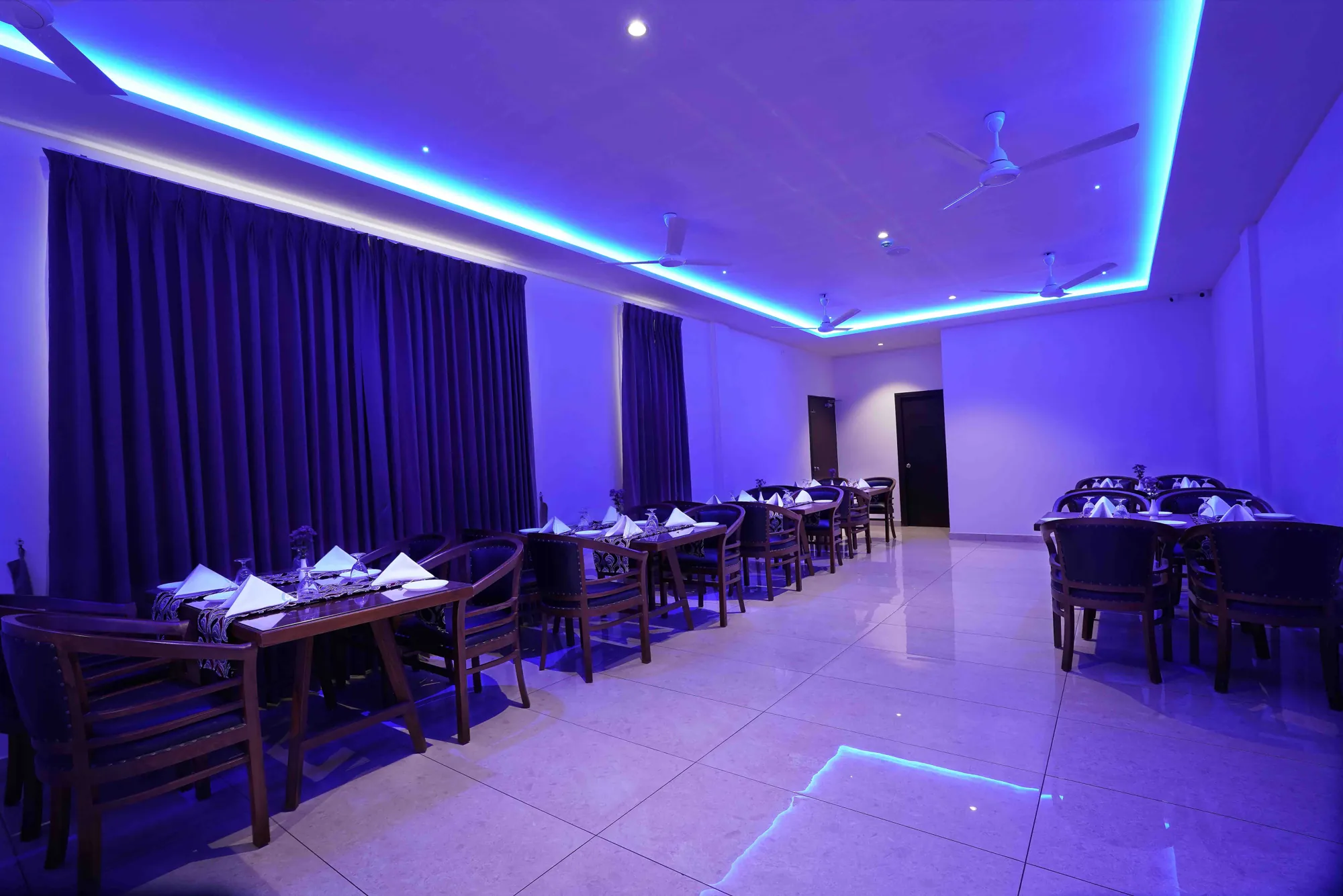 The restaurant in the evening, lit by blue cove lighting